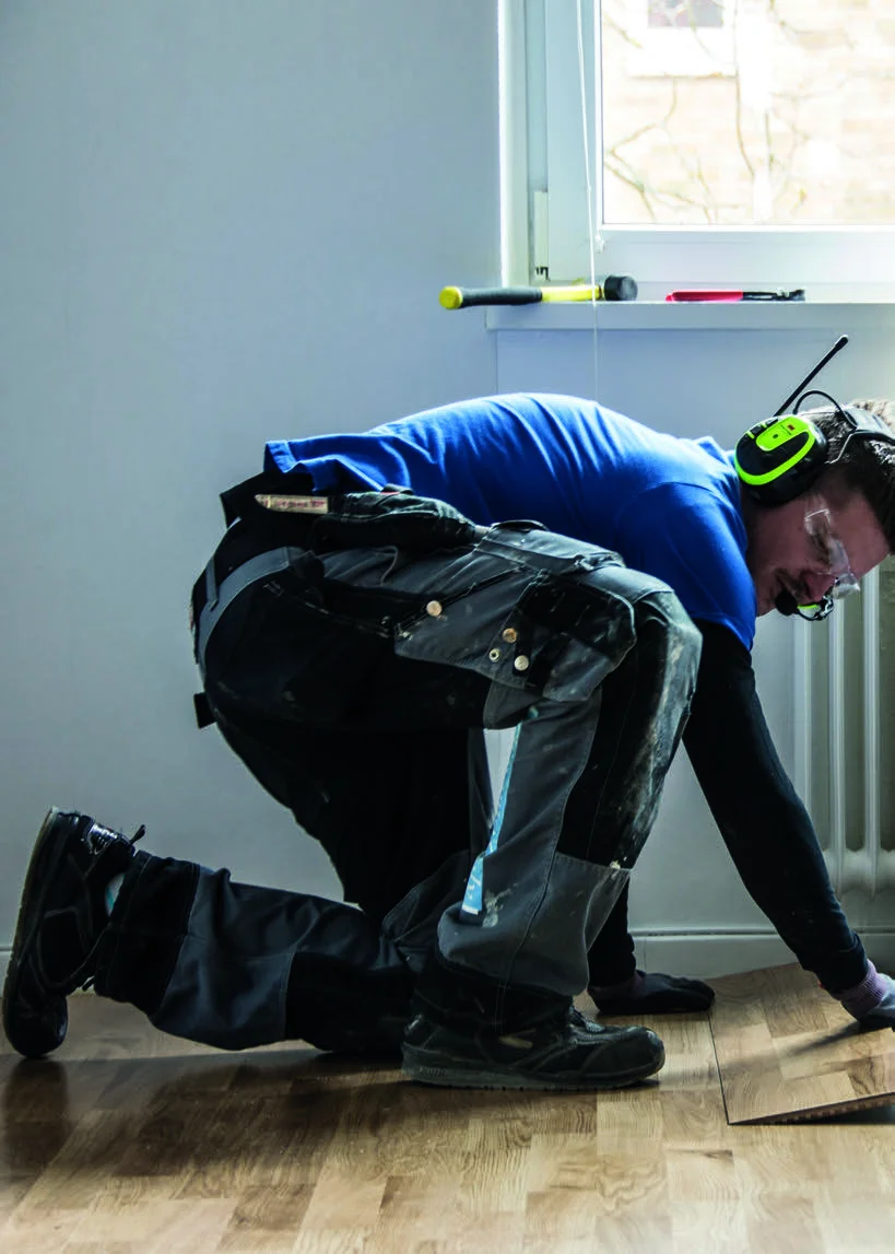 3M Worker Using Safety Equipment